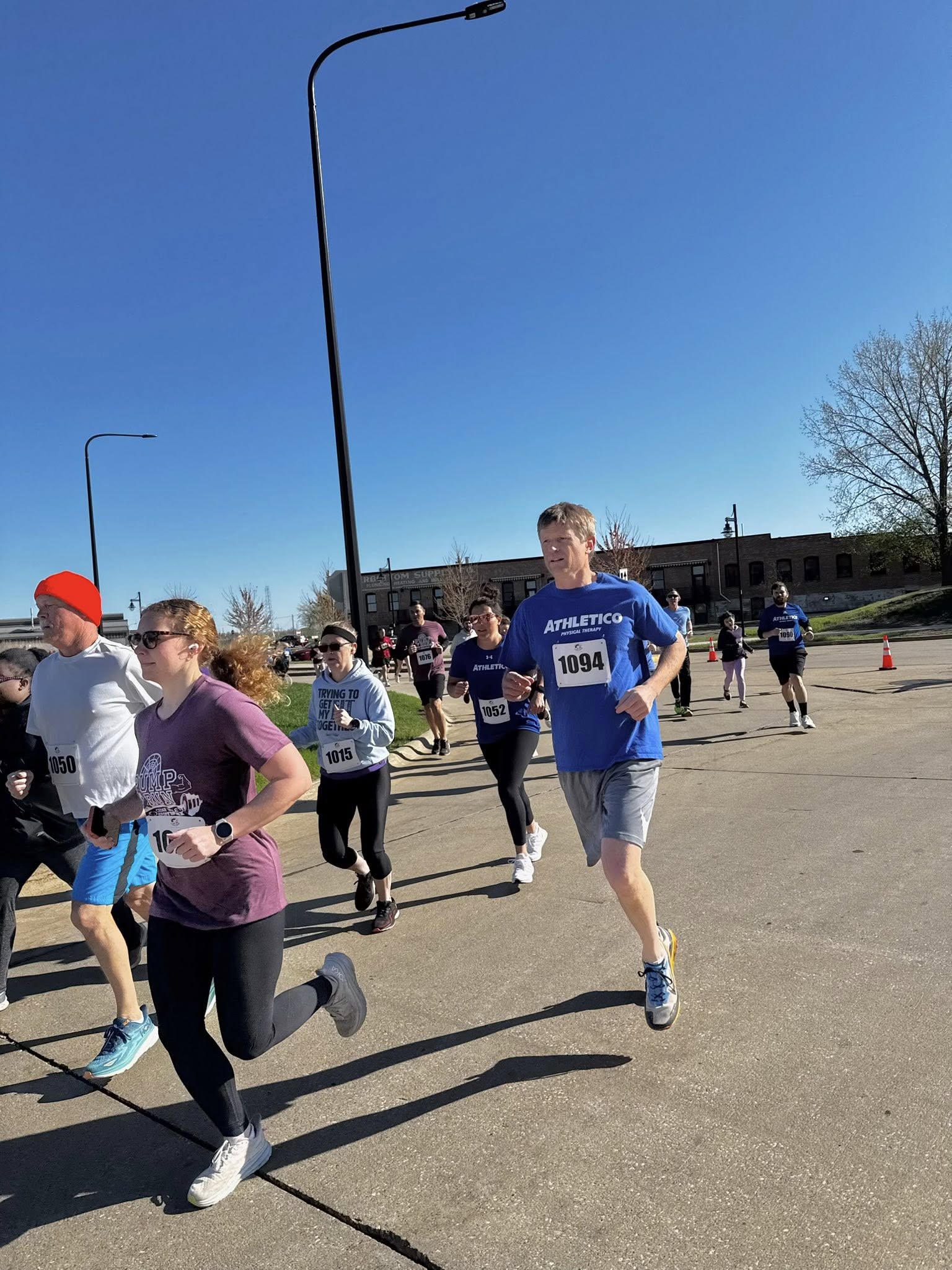 501747765_1251831700280396_3939004546396062029_n a group of people running on the road